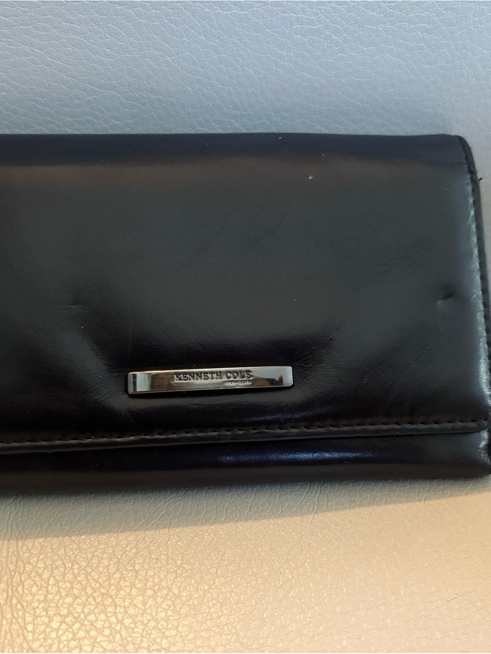 Kenneth Cole Black Leather Bifold with Silver Plaque